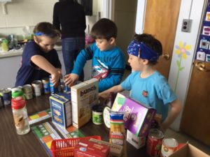 Students count food items for the 100th day of school